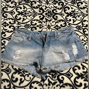Distressed denim shorts